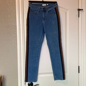 A loves a size 26 tuxedo stripe jeans, excellent condition